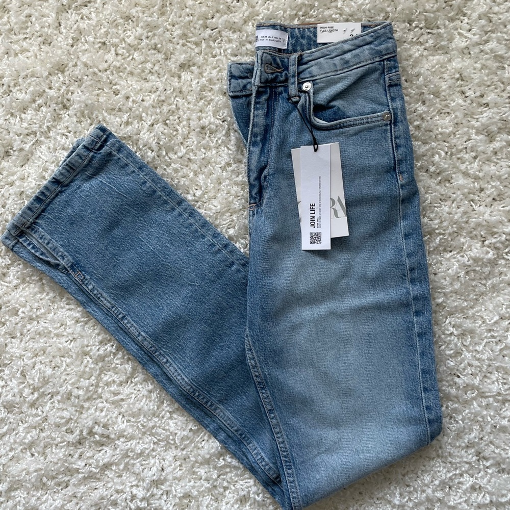 Split hem medium wash jean